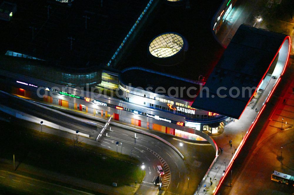 Aerial image at night Berlin - Night lighting building of the shopping center Eastgate Berlin on Marzahner Promenade in the district Marzahn in Berlin, Germany