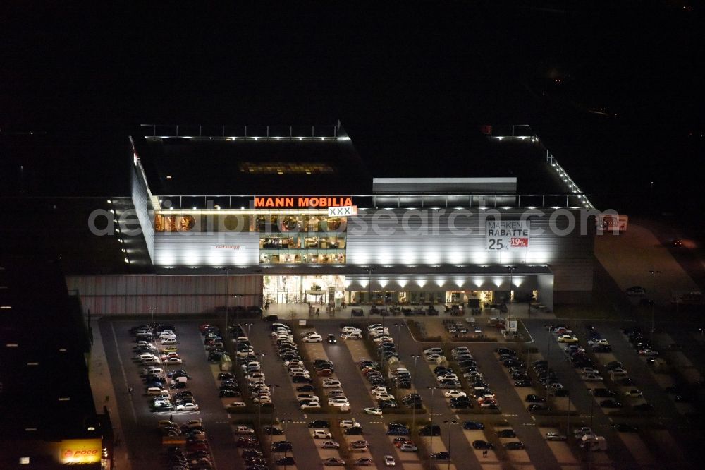 Aerial photograph at night Eschborn - Night view Building of the store - furniture market XXXL Mann Mobilia in Sulzbach (Taunus) in the state Hesse