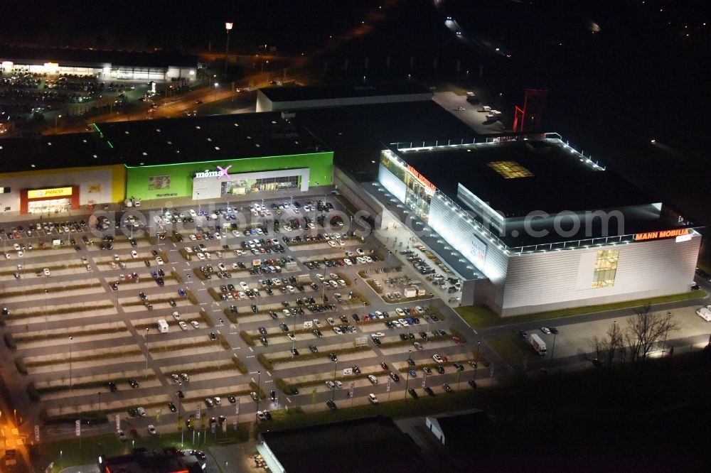 Aerial image at night Eschborn - Night view Building of the store - furniture market moemax Eschborn on Elly-Beinhorn-Strasse in Sulzbach (Taunus) in the state Hesse