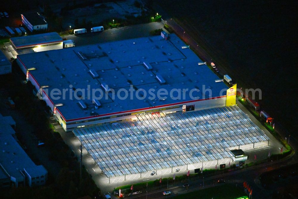 Lindenberg at night from above - Night lighting building of the wholesale center SELGROS Cash & Carry Lindenberg in Lindenberg in the state Brandenburg