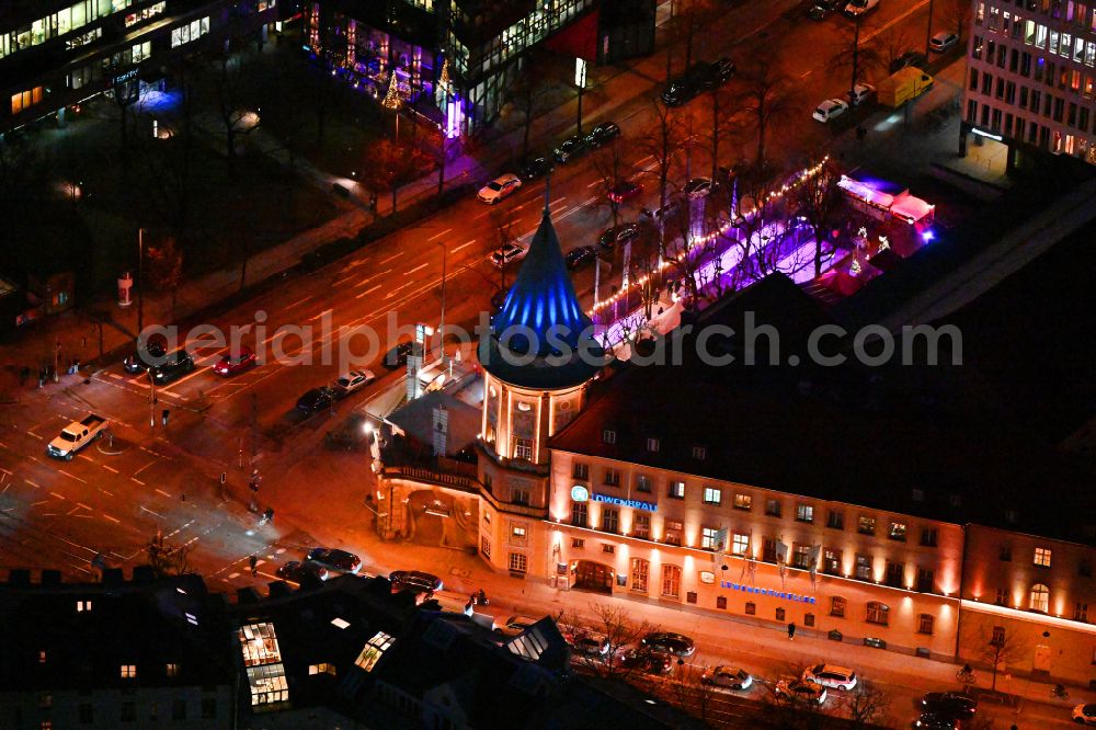 Aerial image at night München - Night lighting building of the restaurant Loewenbraeukeller on street Nymphenburger Strasse - place Stiglmaierplatz on street Nymphenburger Strasse in the district Maxvorstadt in Munich in the state Bavaria, Germany