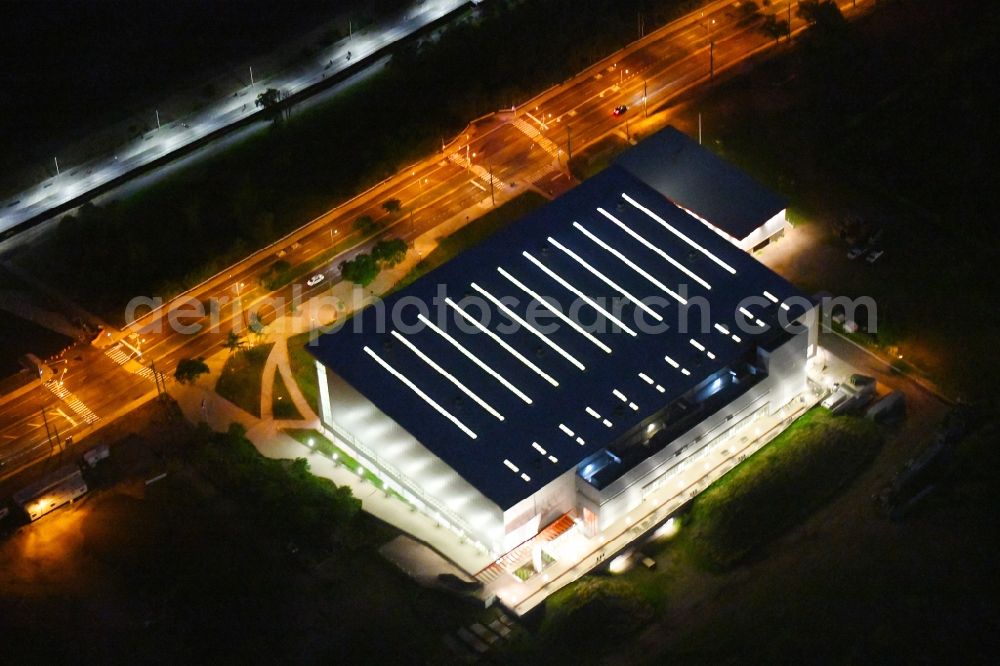 New York at night from above - Night lighting Roof on the building of the sports hall Ocean Breeze Athletic Complex on Father Capodanno Blvd in the district Staten Island in New York in United States of America