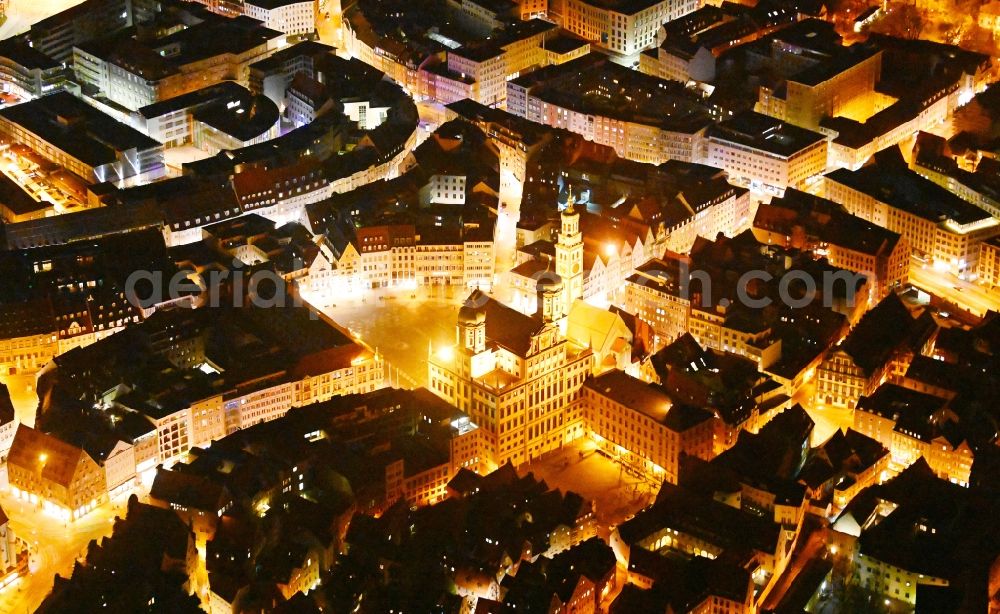 Augsburg at night from the bird perspective: Night lighting town Hall building of the city administration on Rathausplatz and tower Perlachturm and church St. Peter on Perlach in the district Altstadt in Augsburg in the state Bavaria, Germany