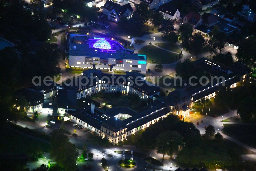 Bad Rothenfelde at night from above - Night lighting Town Hall building of the city administration - Kurverwaltung in Bad Rothenfelde in the state Lower Saxony, Germany