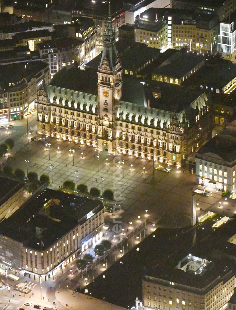 Aerial photograph at night Hamburg - Night lighting Town Hall building of the City Council at the market downtown in Hamburg, Germany
