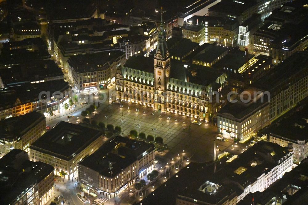 Hamburg at night from the bird perspective: Night lighting Town Hall building of the City Council at the market downtown in Hamburg, Germany