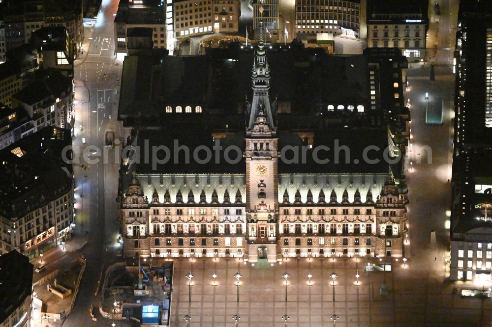 Hamburg at night from above - Night lighting Town Hall building of the City Council at the market downtown in Hamburg, Germany