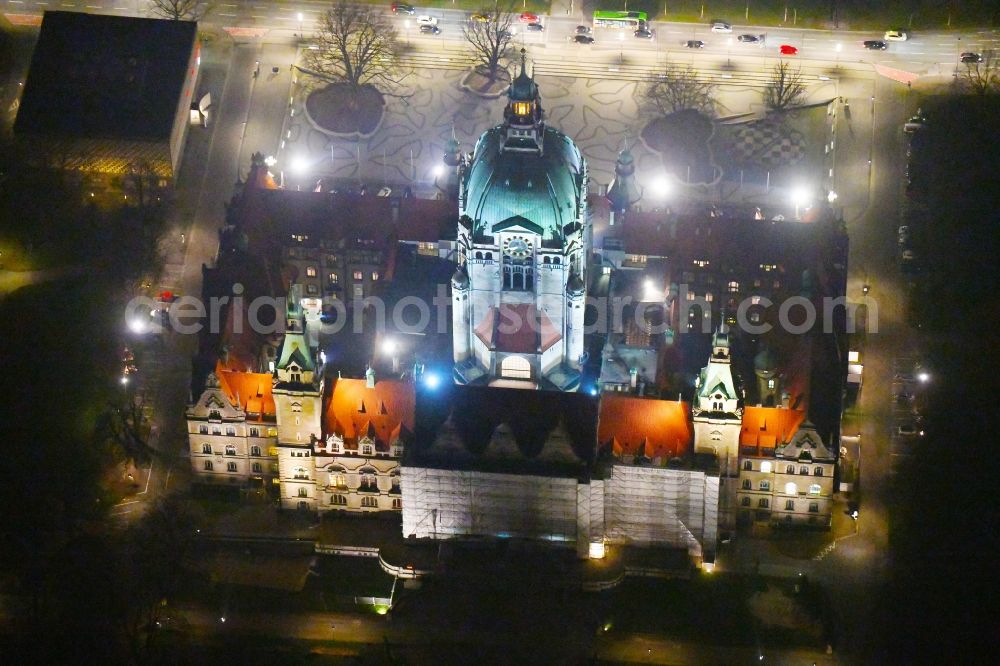 Hannover at night from above - Night lighting City hall and administration building Neues Rathaus on Trammplatz square in Hannover in the state of Lower Saxony. The building is located on the pond Maschteich in the historical city center