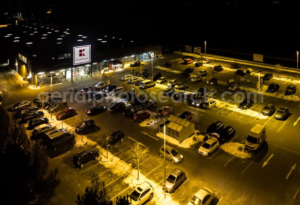 Eberswalde at night from above - Night lighting Building of the supermarket Kaufland in Eberswalde in the state Brandenburg, Germany