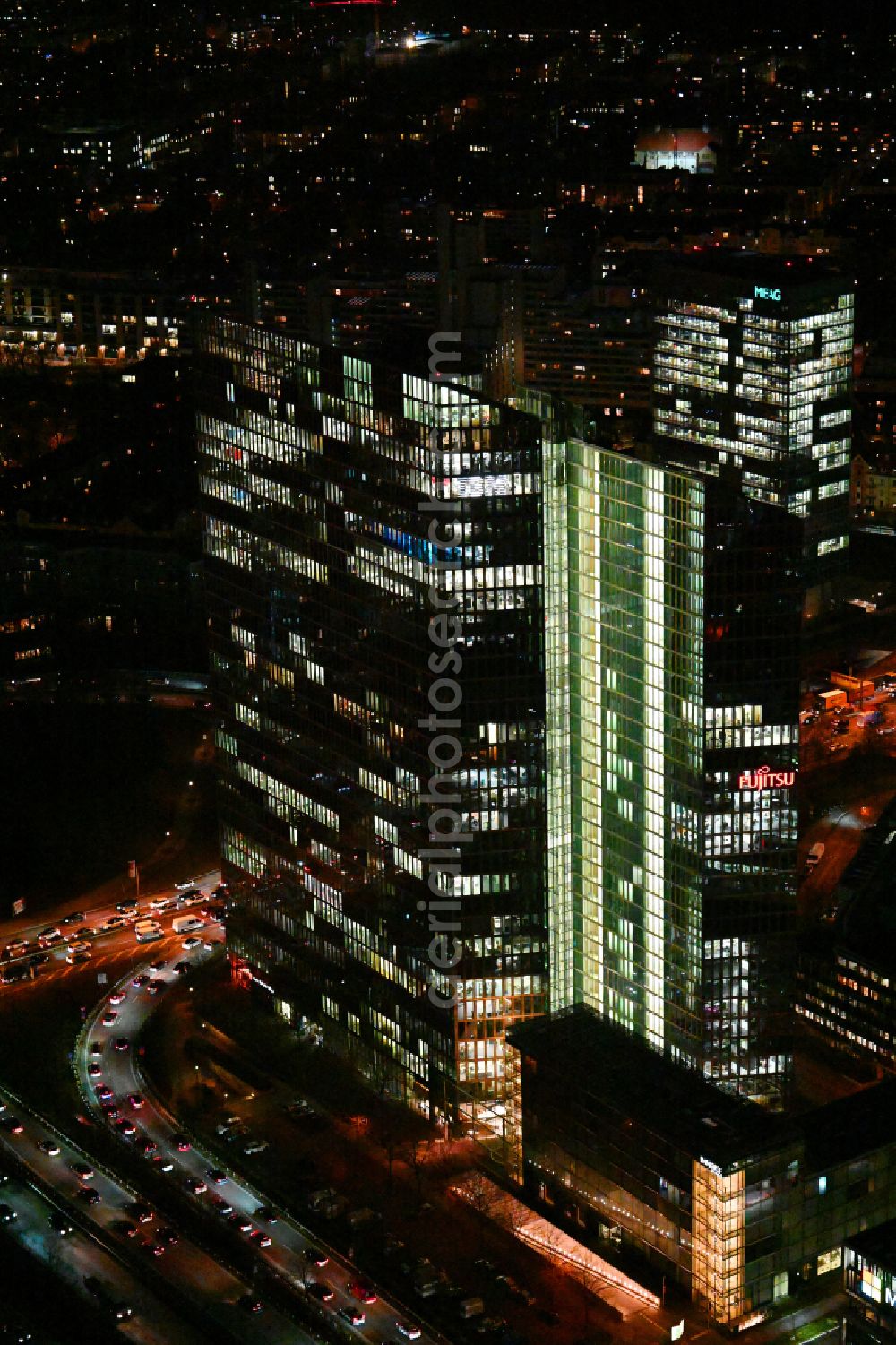Aerial image at night München - Night lighting high-rise building complex HighLight Towers on corner Mies-van-der-Rohe- und Walter-Gropius-Strasse in the district Schwabing-Freimann in Munich in the state Bavaria, Germany