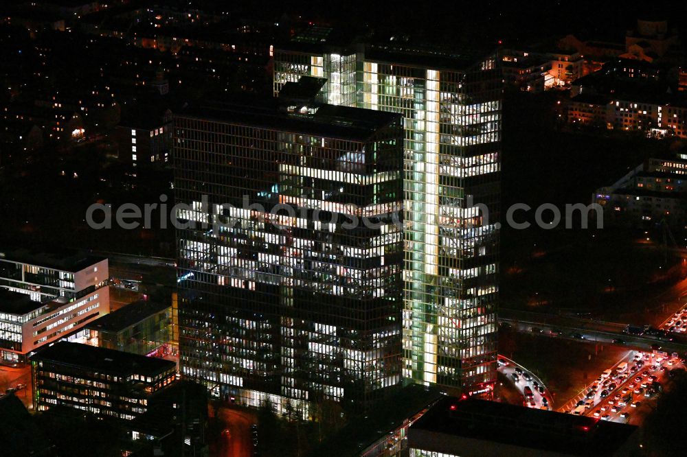 München at night from the bird perspective: Night lighting high-rise building complex HighLight Towers on corner Mies-van-der-Rohe- und Walter-Gropius-Strasse in the district Schwabing-Freimann in Munich in the state Bavaria, Germany