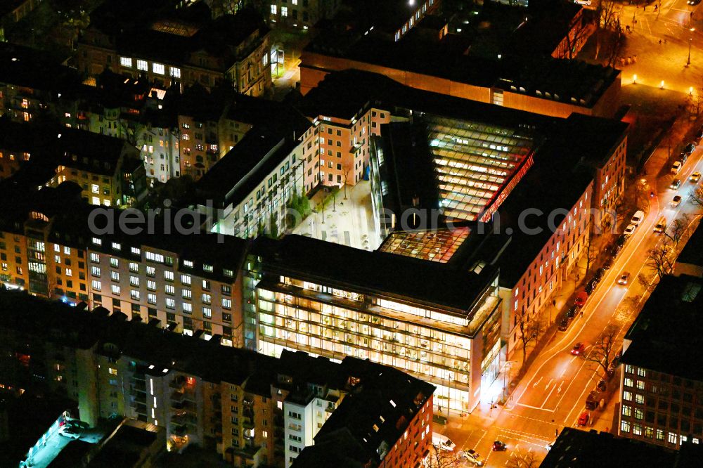 Aerial image at night München - Night lighting building complex of the university for politics on street Richard-Wagner-Strasse - Augustenstrasse - Brienner Strasse in the district Maxvorstadt in Munich in the state Bavaria, Germany