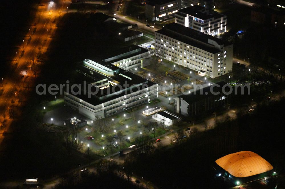 Berlin at night from above - Night lighting building complex of the institute Chemical laboratory building of the Federal Institute for Materials Testing and Research BAM on Richard-Willstaetter-Strasse in Berlin, Germany