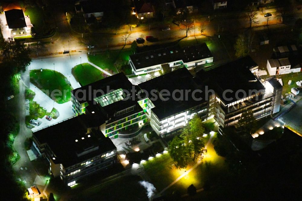 Berlin at night from above - Night lighting Building complex of the Institute Max-Planck-Institut fuer molekulare Genetik on Ihnestrasse in the district Dahlem in Berlin