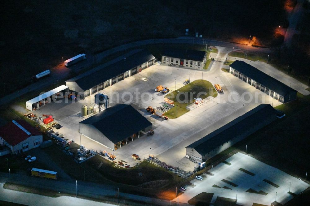 Fahrbinde at night from the bird perspective: Night lighting building complex and distribution center on the site the motorway maintenance authority in Fahrbinde on street Ahornstrasse in the state Mecklenburg - Western Pomerania, Germany