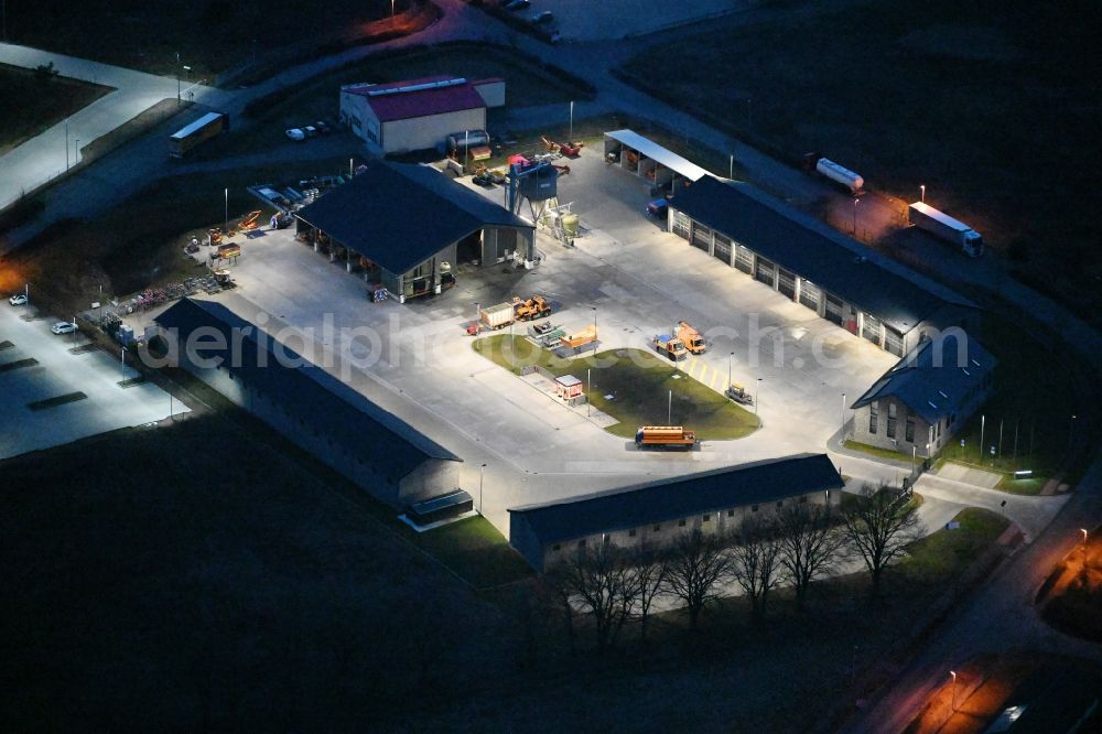 Aerial image at night Fahrbinde - Night lighting building complex and distribution center on the site the motorway maintenance authority in Fahrbinde on street Ahornstrasse in the state Mecklenburg - Western Pomerania, Germany