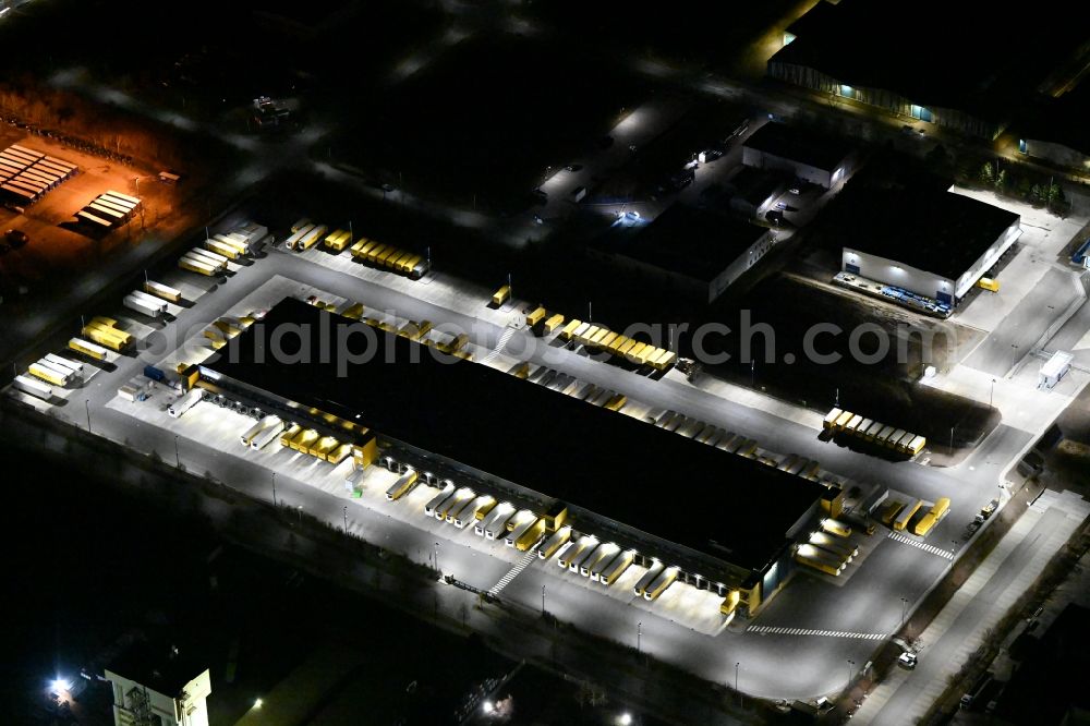 Thörey at night from above - Night lighting building complex and distribution center on the site of DACHSER SE in Thoerey in the state Thuringia, Germany