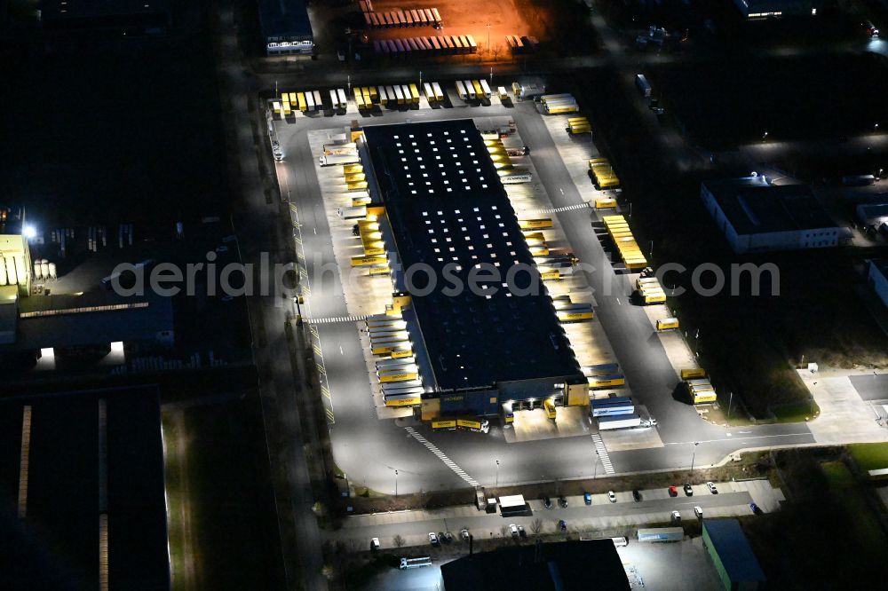 Thörey at night from the bird perspective: Night lighting building complex and distribution center on the site of DACHSER SE in Thoerey in the state Thuringia, Germany