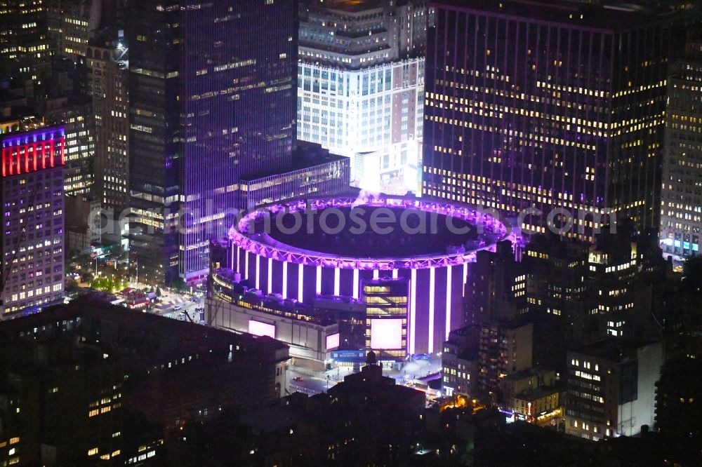 Aerial image at night New York - Night lighting Event and music-concert grounds of the Amtrak - Arena on Pennsylvania Station on Madison Square Garden in the district Manhattan in New York in United States of America