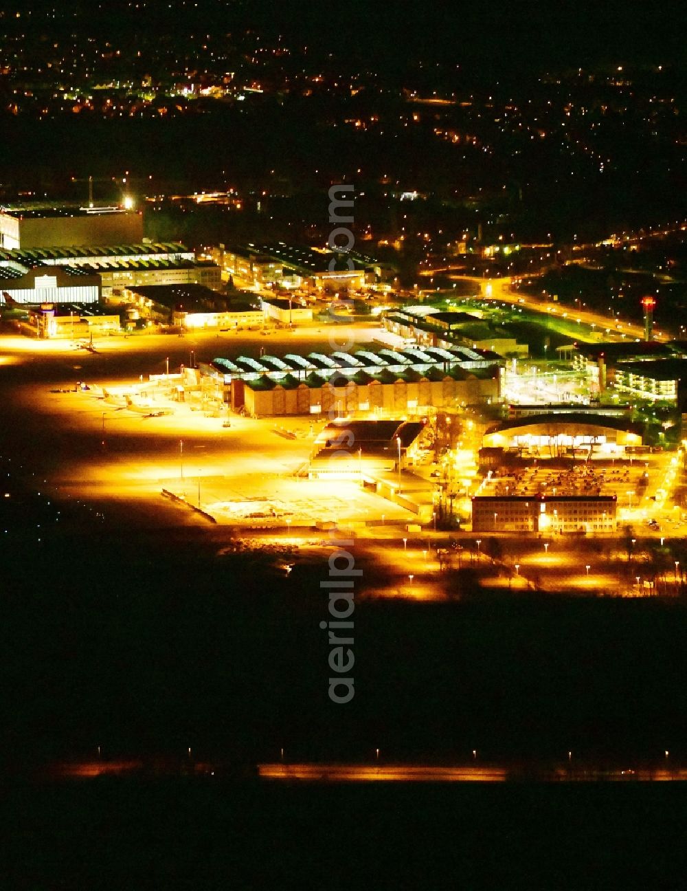 Aerial photograph at night Dresden - Night lighting Runway with hangar taxiways and terminals on the grounds of the airport in the district Klotzsche in Dresden in the state Saxony, Germany