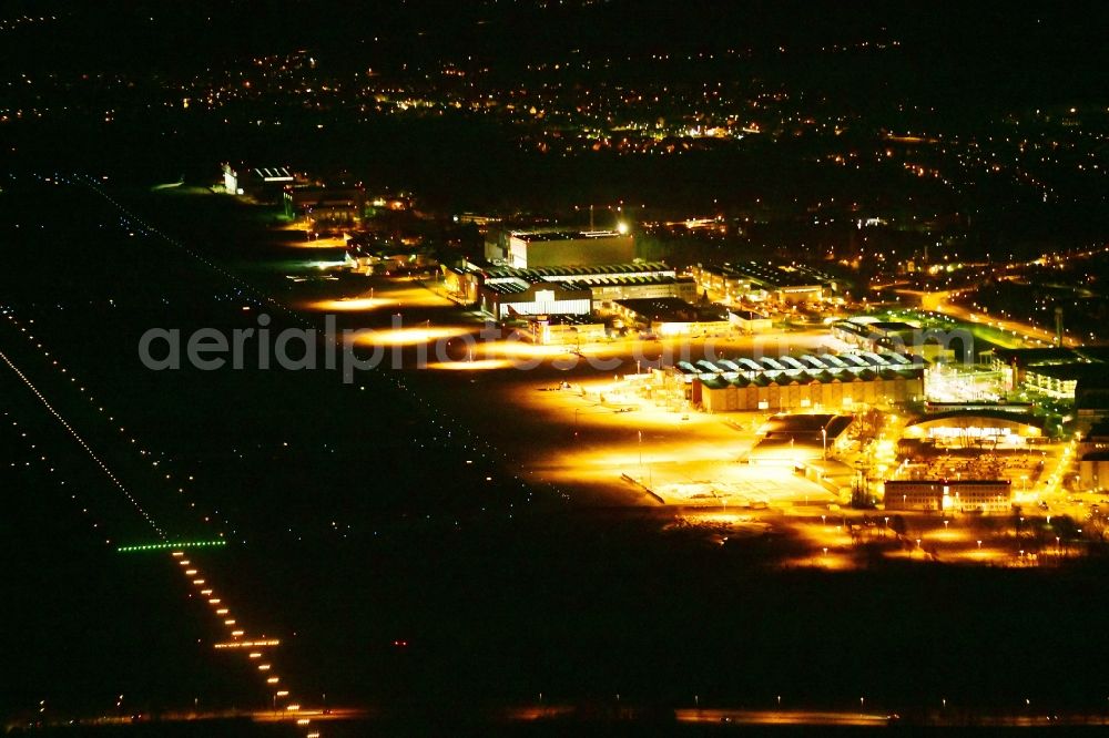 Aerial image at night Dresden - Night lighting Runway with hangar taxiways and terminals on the grounds of the airport in the district Klotzsche in Dresden in the state Saxony, Germany