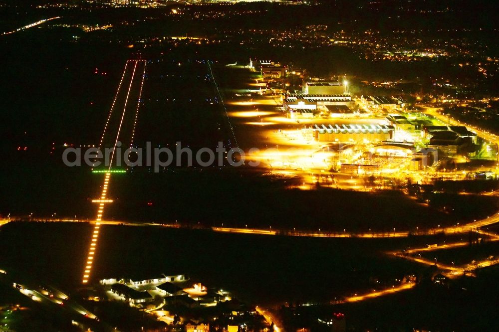 Aerial image at night Dresden - Night lighting Runway with hangar taxiways and terminals on the grounds of the airport in the district Klotzsche in Dresden in the state Saxony, Germany