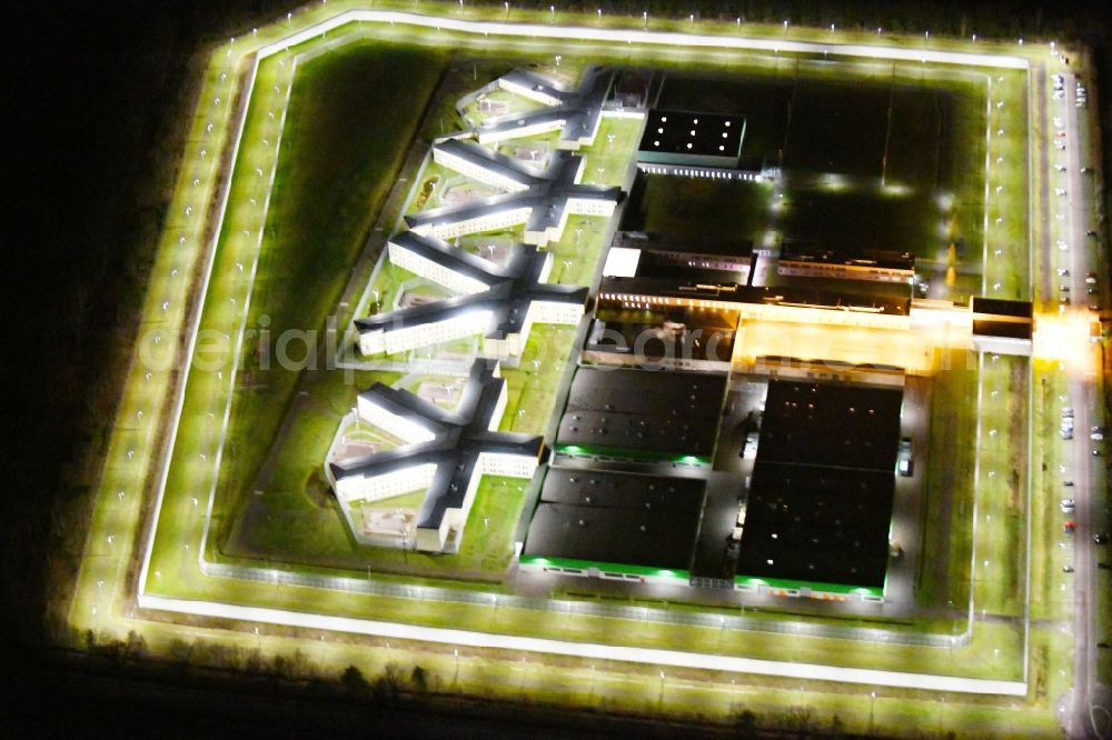 Aerial photograph at night Burg - Night lighting prison grounds and high security fence Prison in Burg in the state Saxony-Anhalt
