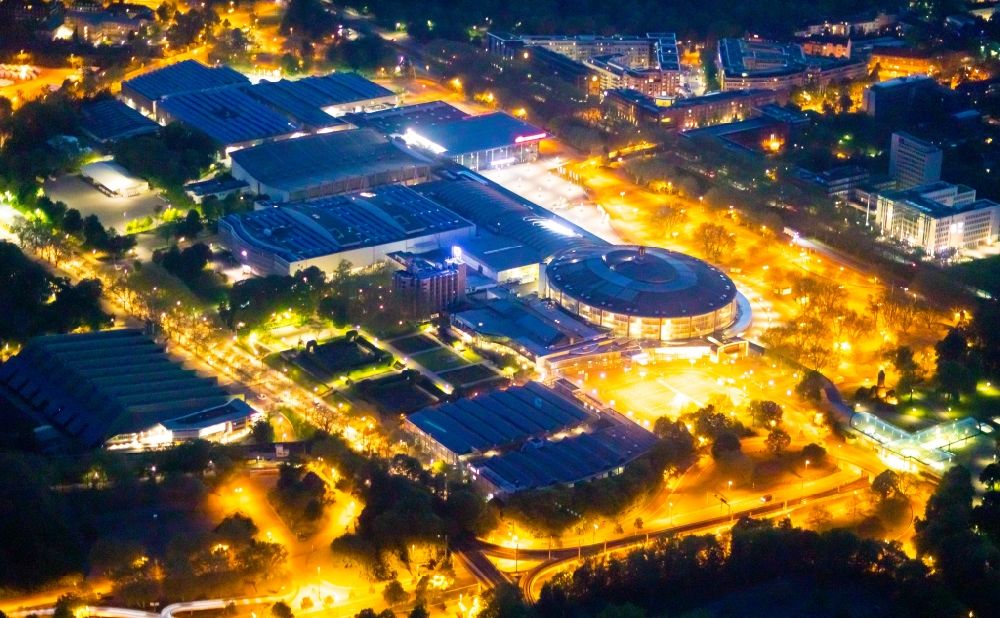 Dortmund at night from above - Night lighting exhibition grounds, congress center and exhibition halls of the Westfalenhallen in Dortmund in the state of North Rhine-Westphalia