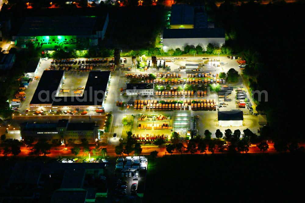 Aerial photograph at night Berlin - Night lighting site waste and recycling sorting BSR Recyclinghof Nordring in the district Marzahn in Berlin, Germany
