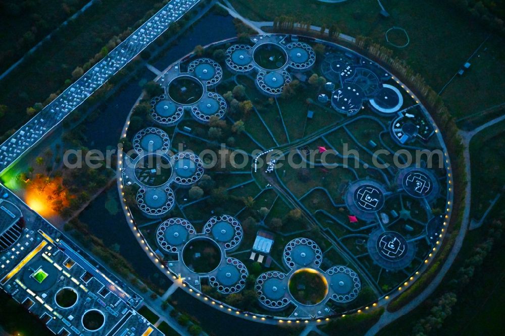 Aerial image at night Berlin - Night lighting site of the animal shelter, also known as the city of animals, destrict Hohenschoenhausen in Berlin in Germany
