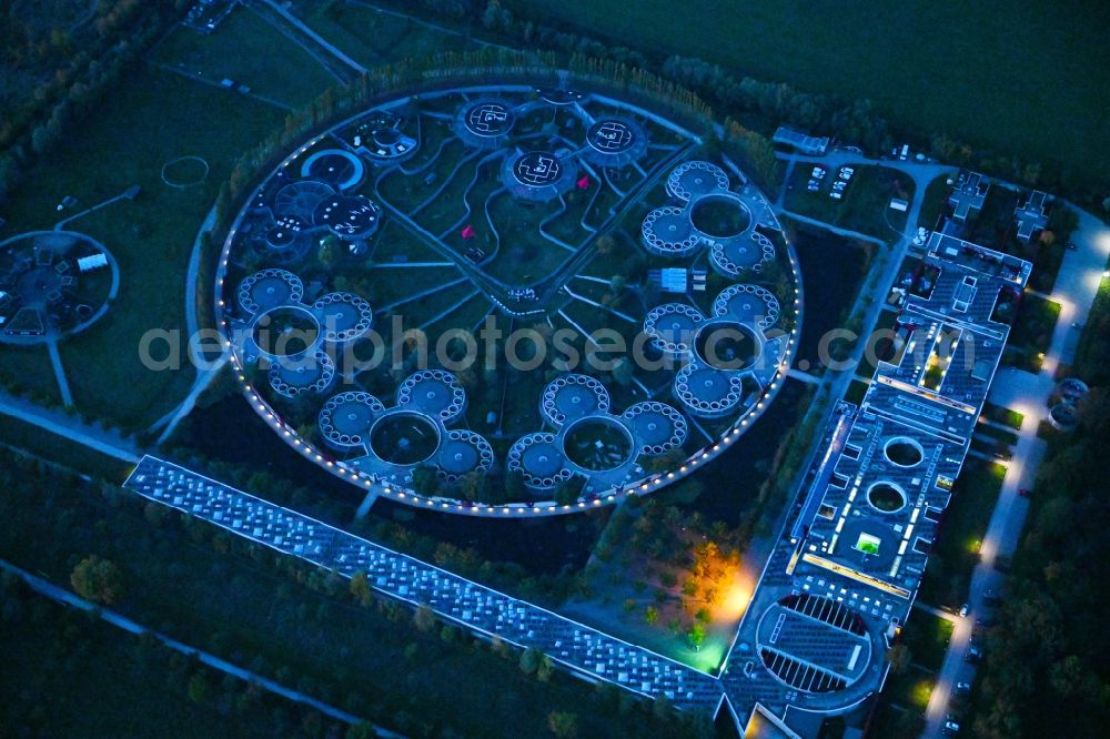 Berlin at night from the bird perspective: Night lighting site of the animal shelter, also known as the city of animals, destrict Hohenschoenhausen in Berlin in Germany