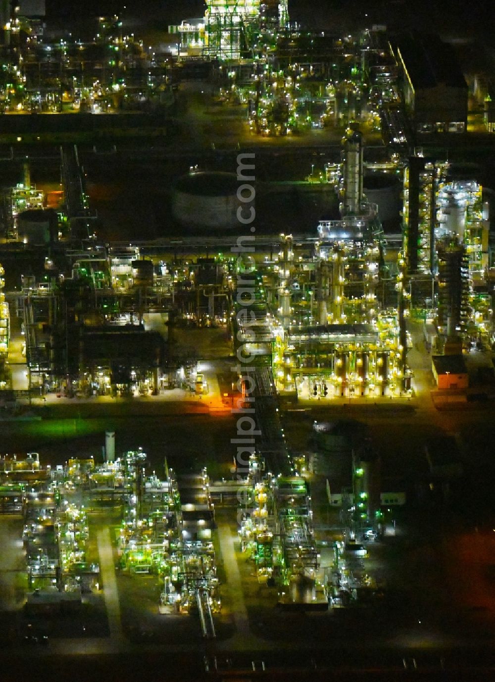 Schwedt/Oder at night from above - Night lighting Site of PCK Refinery GmbH, a petroleum processing plant in Schwedt / Oder in the northeast of the state of Brandenburg