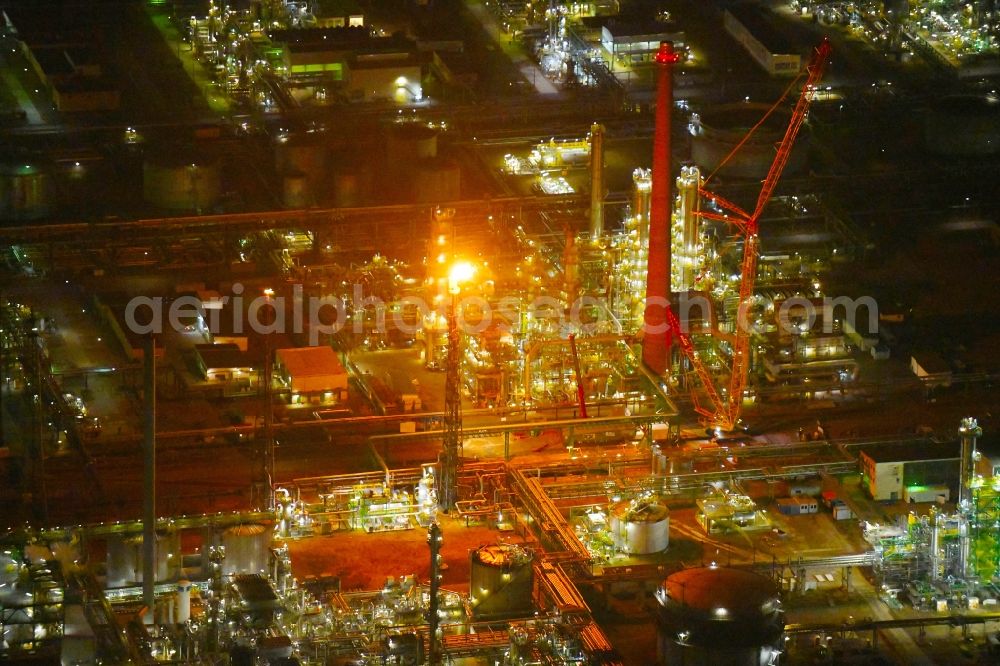Aerial image at night Schwedt/Oder - Night lighting Site of PCK Refinery GmbH, a petroleum processing plant in Schwedt / Oder in the northeast of the state of Brandenburg
