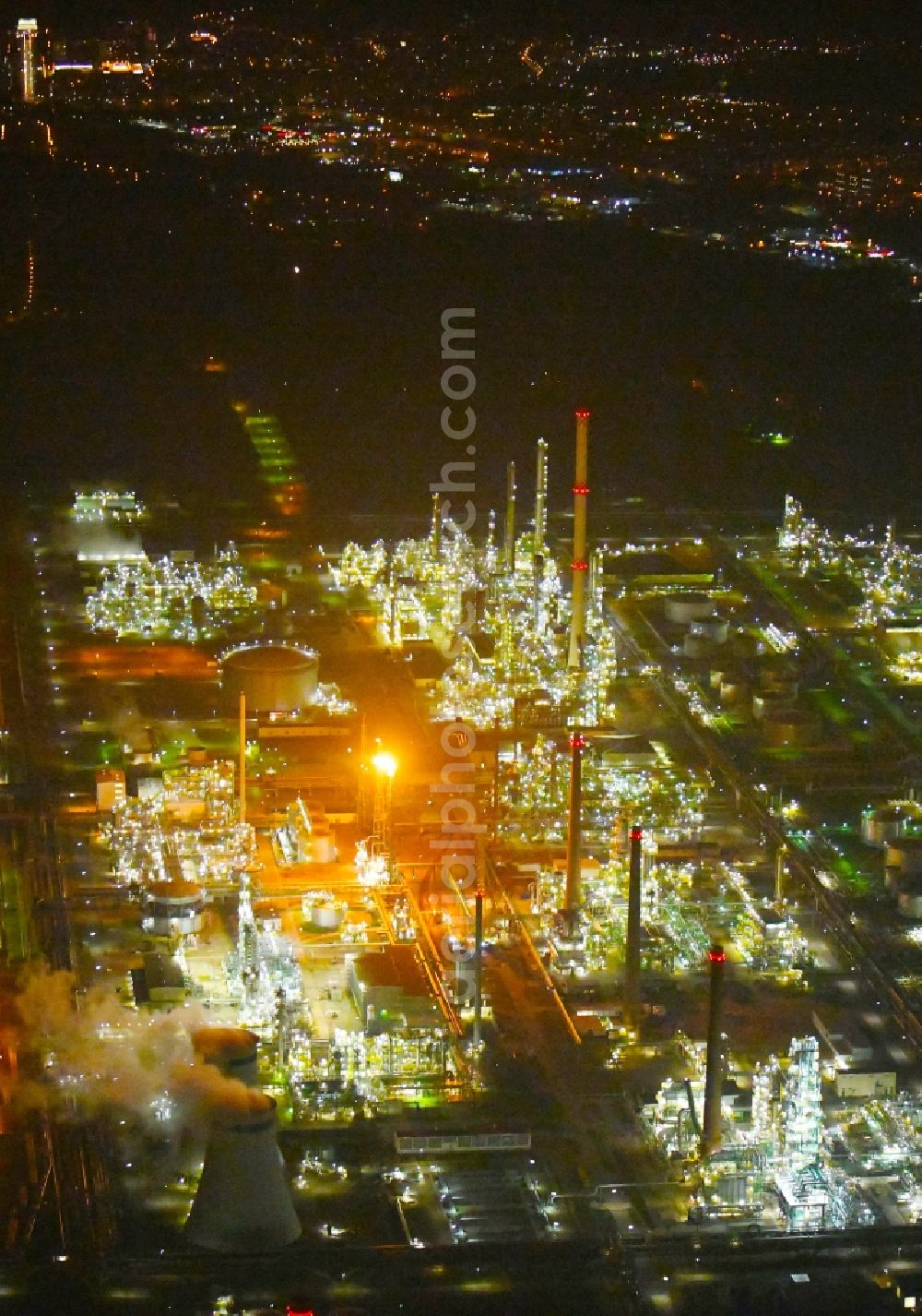 Schwedt/Oder at night from above - Night lighting Site of PCK Refinery GmbH, a petroleum processing plant in Schwedt / Oder in the northeast of the state of Brandenburg