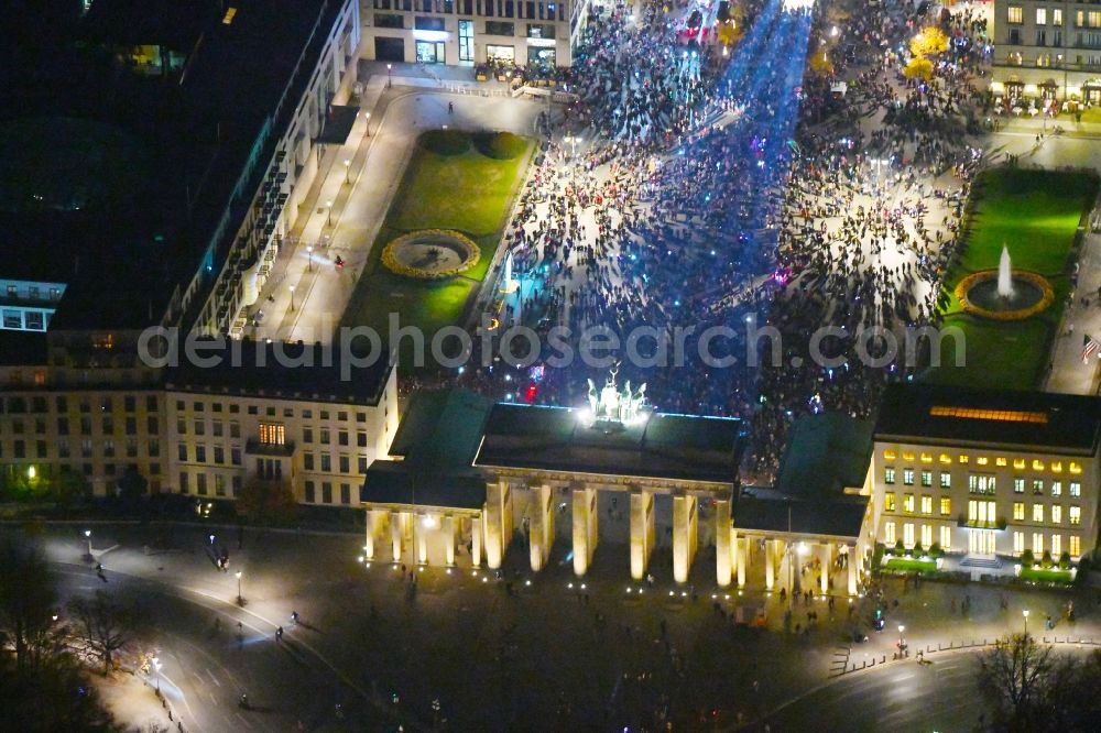 Berlin at night from above - Night lighting Tourist attraction of the historic monument Brandenburger Tor on Pariser Platz - Unter den Linden in the district Mitte in Berlin, Germany