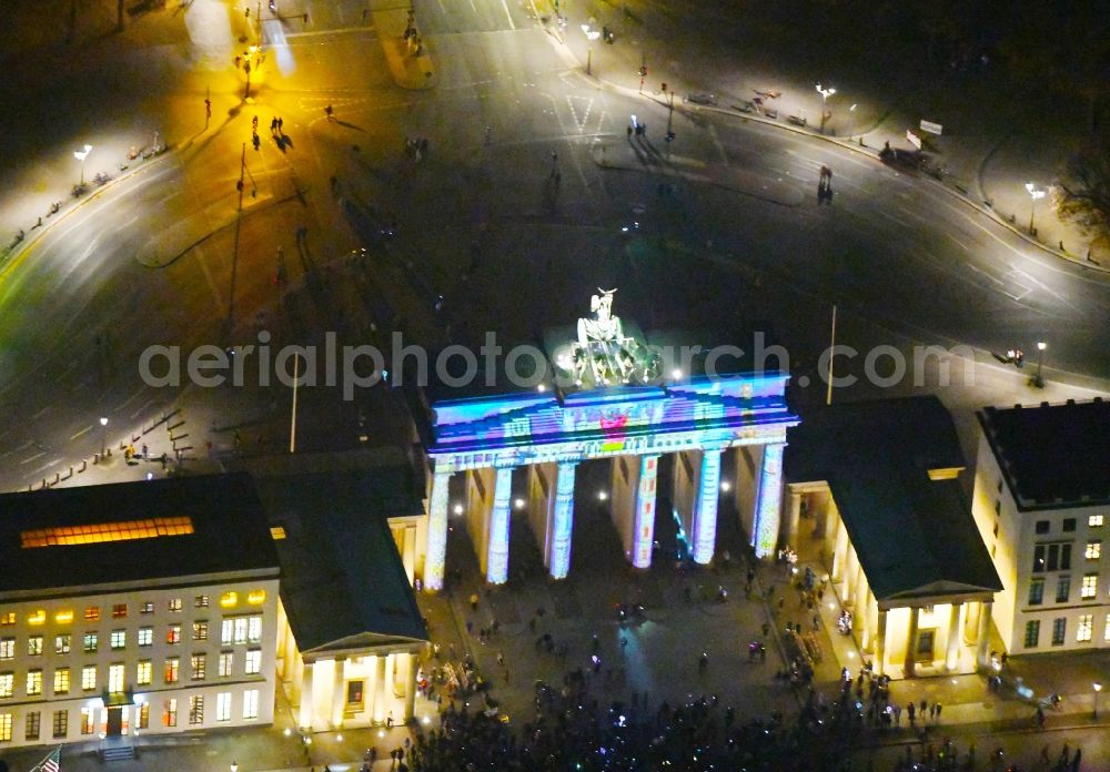 Berlin at night from above - Night lighting Tourist attraction of the historic monument Brandenburger Tor on Pariser Platz - Unter den Linden in the district Mitte in Berlin, Germany