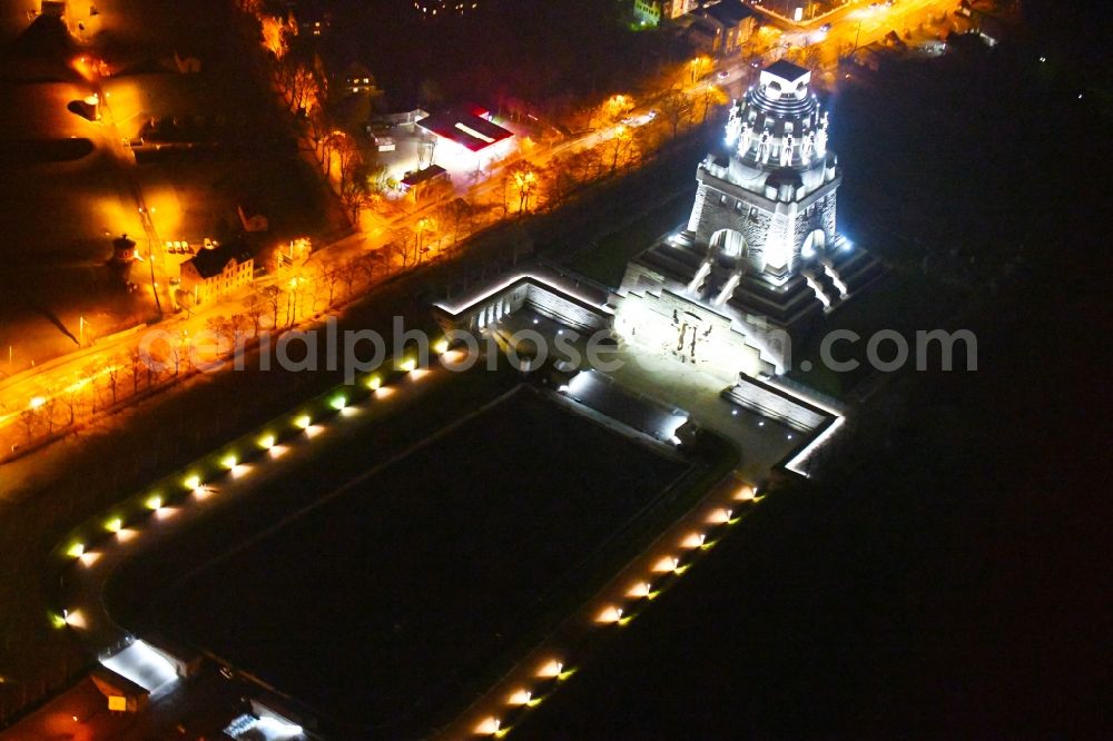 Leipzig at night from the bird perspective: Night lighting Tourist attraction of the historic monument Voelkerschlachtdenkmal on Strasse of 18. Oktober in Leipzig in the state Saxony, Germany