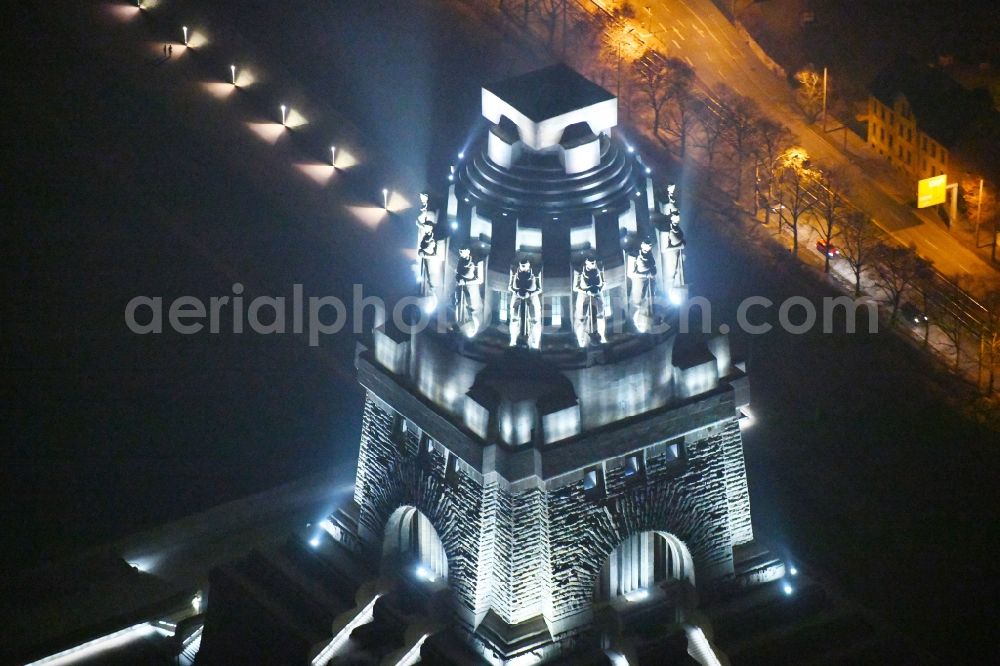 Leipzig at night from the bird perspective: Night lighting Tourist attraction of the historic monument Voelkerschlachtdenkmal on Strasse of 18. Oktober in Leipzig in the state Saxony, Germany
