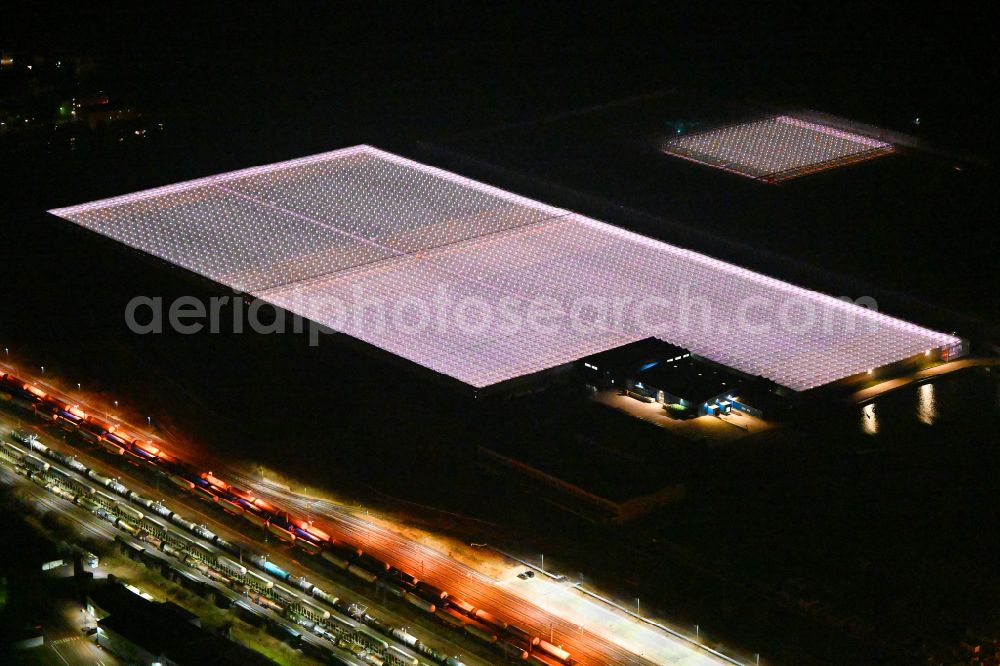 Aerial photograph at night Lutherstadt Wittenberg - Night lighting greenhouse rows of the Wittenberg Vegetable GmbH on Hans-Heinrich-Franck-Strasse in Lutherstadt Wittenberg in the state Saxony-Anhalt, Germany