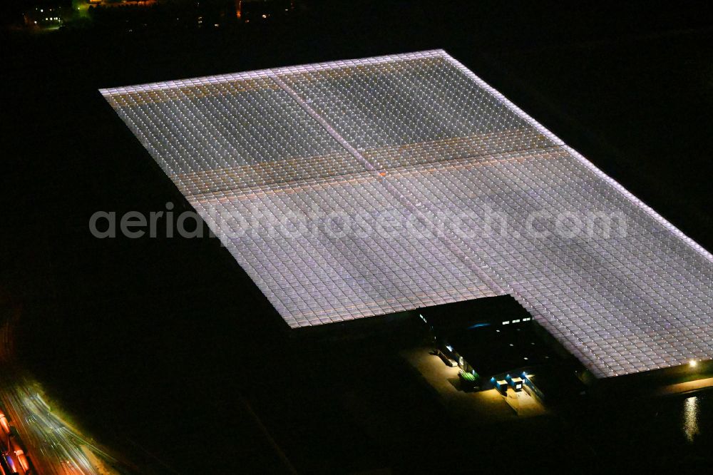 Aerial image at night Lutherstadt Wittenberg - Night lighting greenhouse rows of the Wittenberg Vegetable GmbH on Hans-Heinrich-Franck-Strasse in Lutherstadt Wittenberg in the state Saxony-Anhalt, Germany