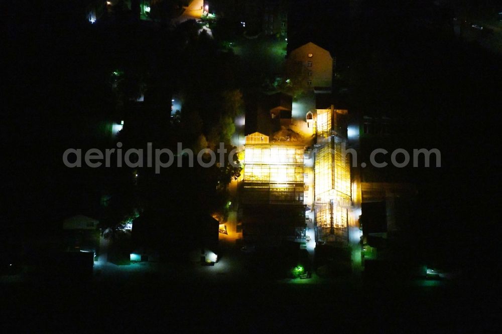 Aerial photograph at night Berlin - Night lighting of the greenhouses on the grounds of the Federal Research Center for Crops in the district Dahlem in Berlin, Germany