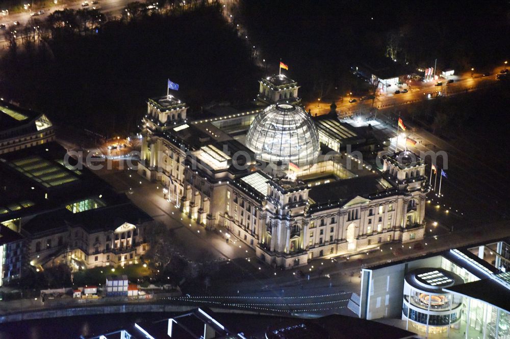 Aerial photograph at night Berlin - Night lighting Glass dome on the roof of Reichstag in Berlin on the Spree sheets in Berlin - Mitte