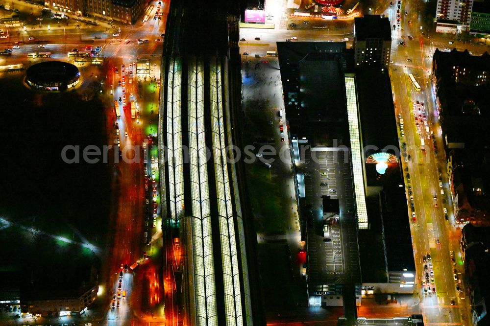 Aerial photograph at night Berlin - Night lighting tracks of the Spandau S-Bahn station and the Spandau Arcaden shopping centre on Klosterstrasse in the Spandau district of Berlin, Germany
