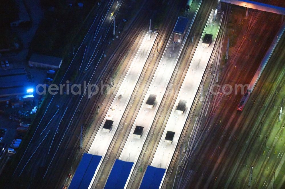 Berlin at night from above - Night lighting Railway tracks and platforms of the station Lichtenberg in Berlin