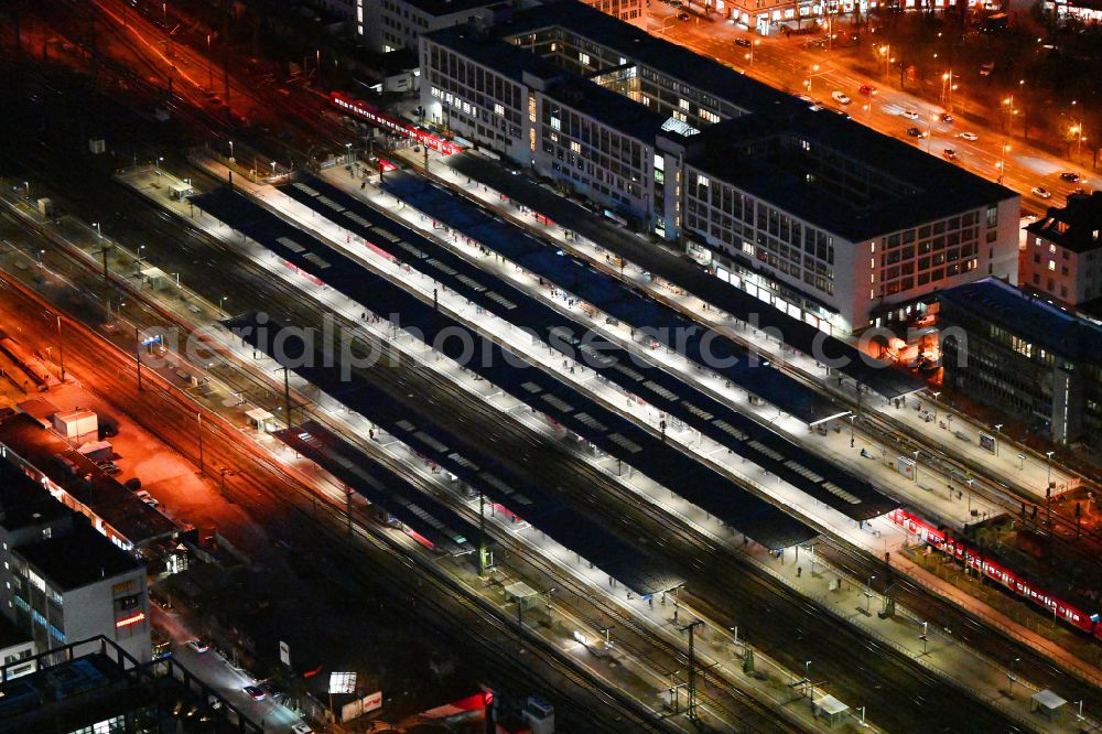 Aerial image at night München - Night lighting station railway building of the Deutsche Bahn in the district Au-Haidhausen in Munich in the state Bavaria, Germany