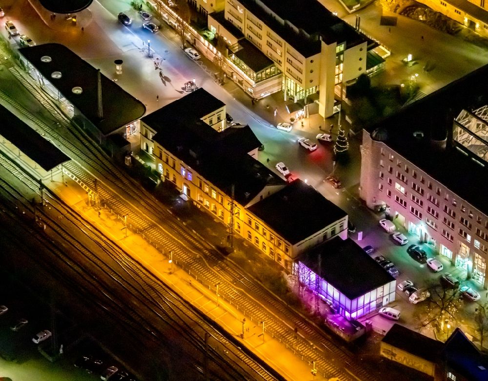 Unna at night from above - Night lighting station railway building of the Deutsche Bahn in Unna in the state North Rhine-Westphalia, Germany