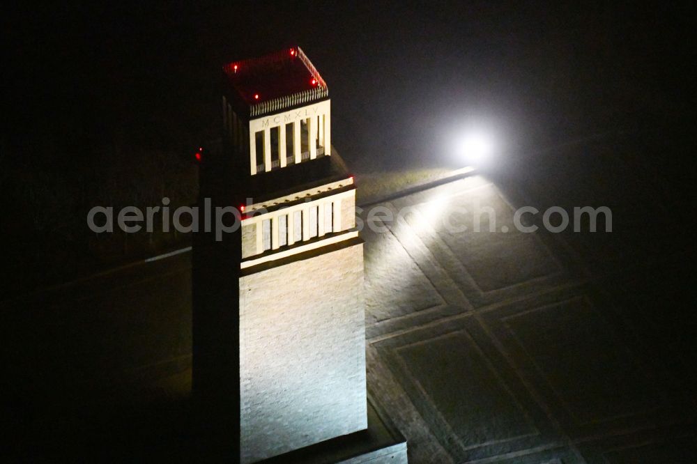 Aerial photograph at night Weimar - Night lighting tourist attraction of the historic monument Nationale Mahn- and Gedenkstaette of DDR Buchenwald in the district Ettersberg in Weimar in the state Thuringia, Germany