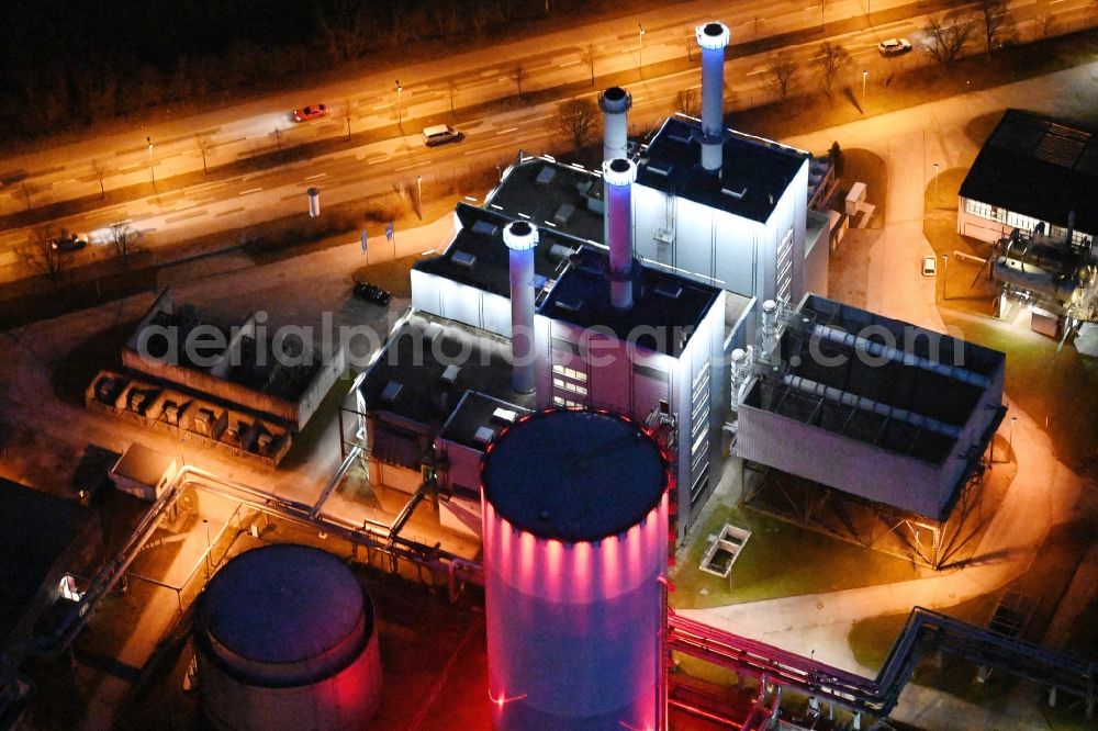 Schwerin at night from the bird perspective: Night lighting combined cycle power plant with gas and steam turbine systems on Pampower Strasse in the district Krebsfoerden in Schwerin in the state Mecklenburg - Western Pomerania, Germany
