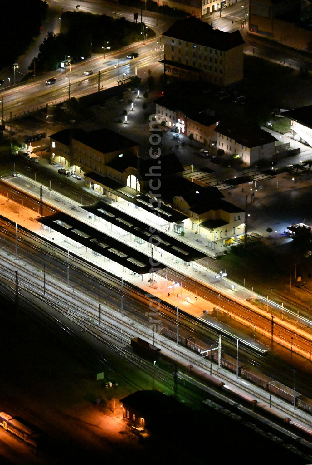 Eberswalde at night from above - Night lighting Track progress and building of the main station of the railway on street Bahnhofsring in Eberswalde in the state Brandenburg, Germany