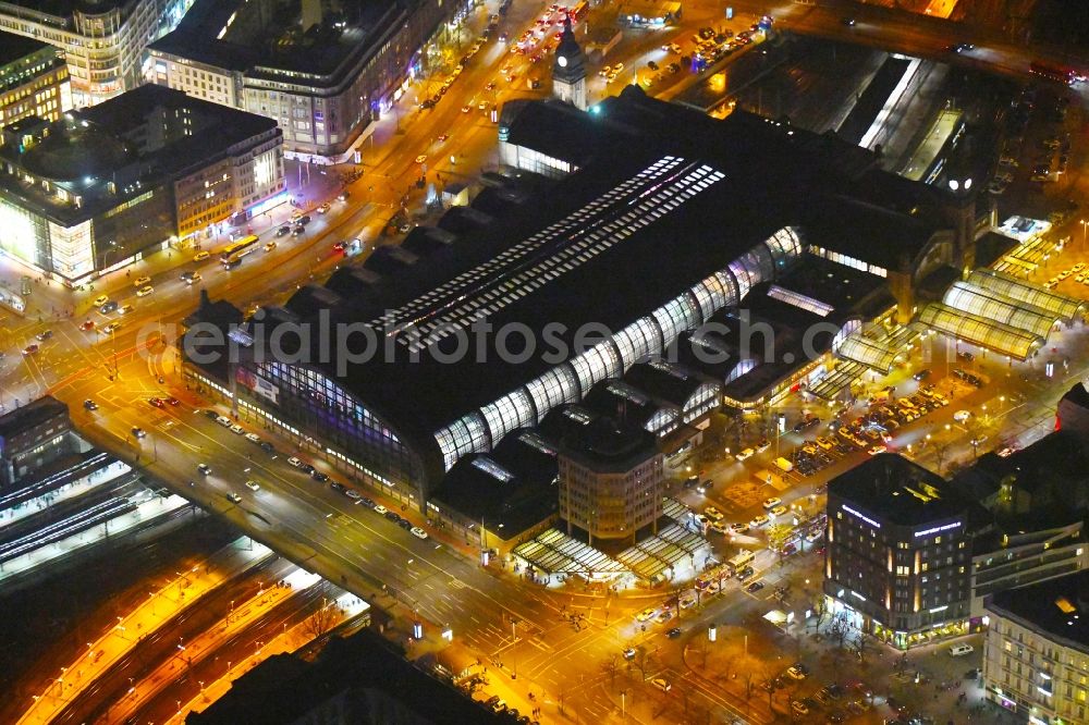 Aerial photograph at night Hamburg - Night lighting track progress and building of the main station of the railway in Hamburg, Germany